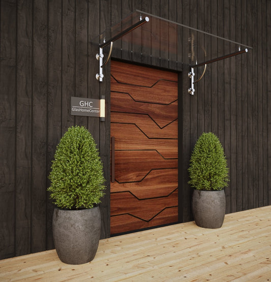 Modernes Glasvordach aus VSG-Klarglas mit hochwertiger Edelstahl-Befestigung